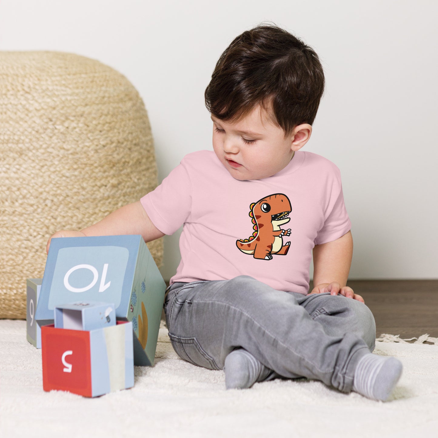 baby t-shirt with adorable dinosaur graphic design