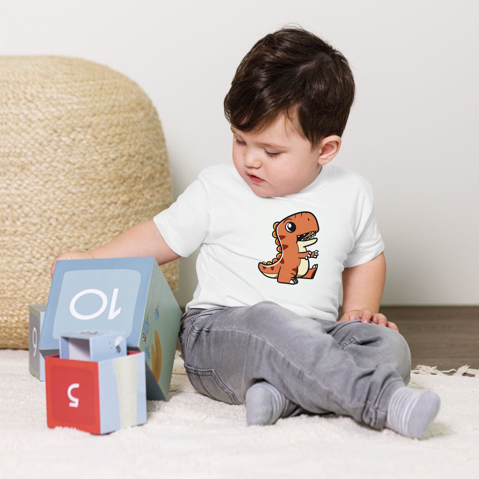 baby t-shirt with adorable dinosaur graphic design