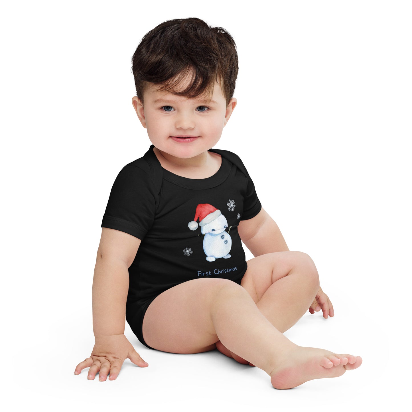 baby onesie with 'first christmas' text and cute santa snowman graphic