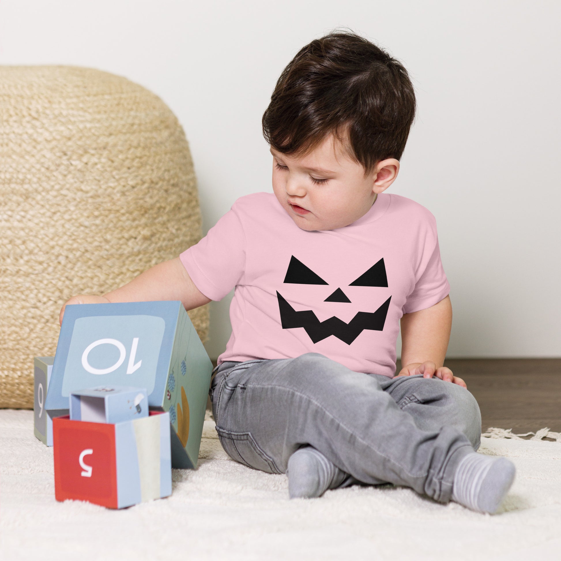 toddler t-shirt with pumpkin carving face design for Halloween