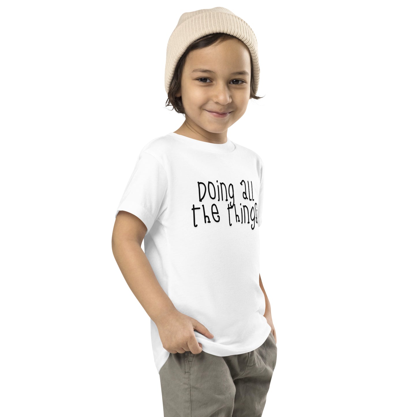 toddler t-shirt with 'Doing All the Things' text in child-like handwritten style
