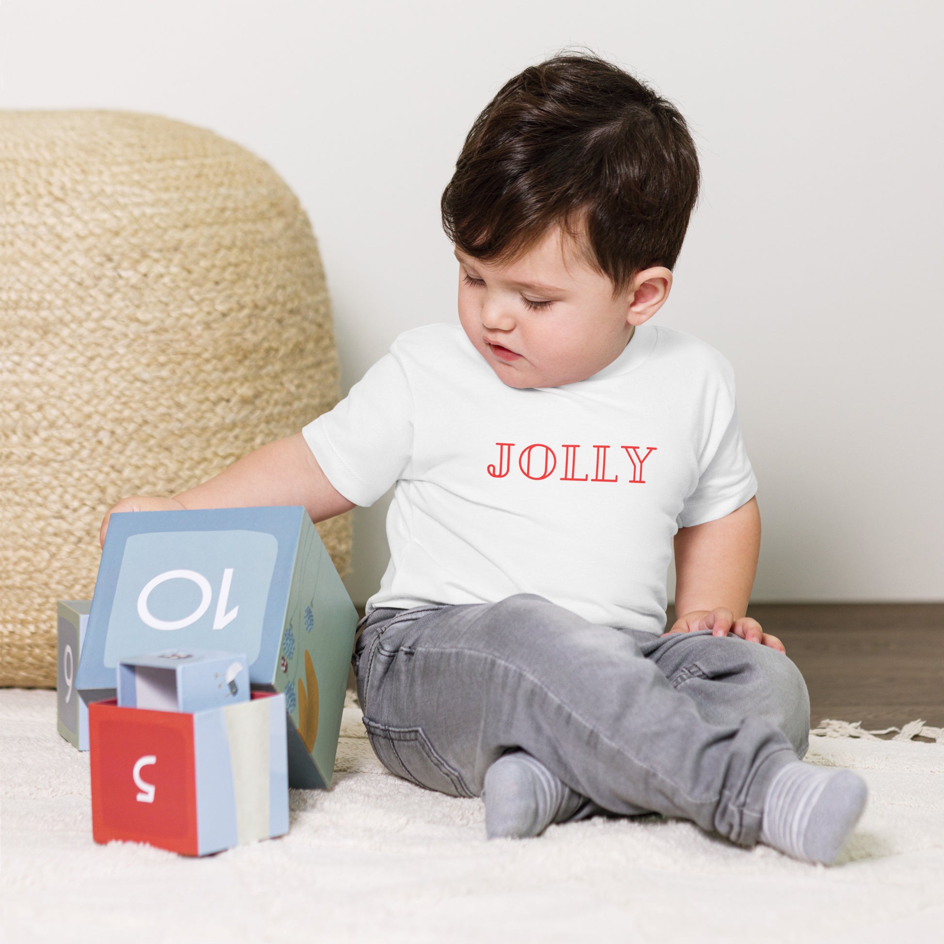 toddler t-shirt with 'Jolly' text design in red
