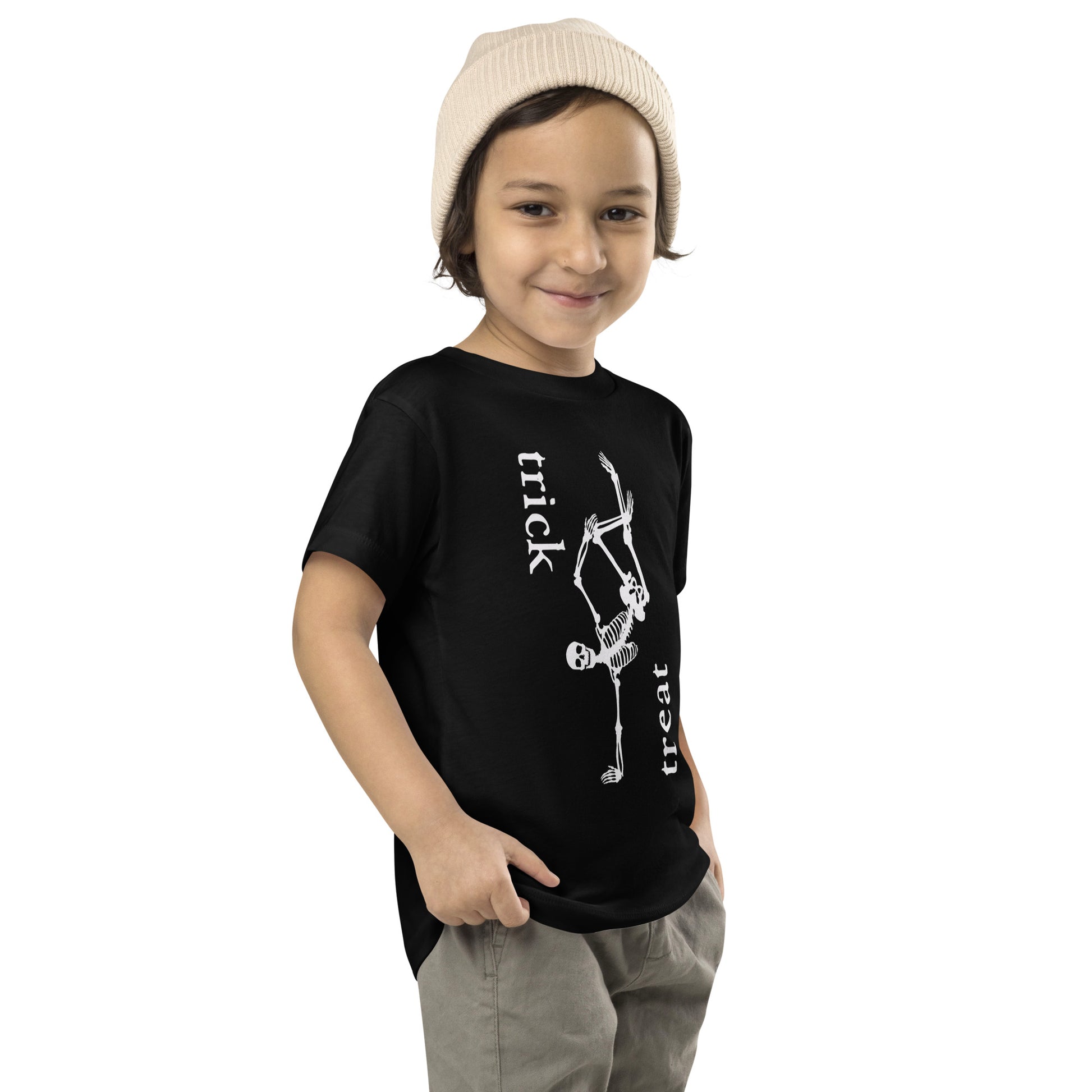 toddler t-shirt with skeleton and 'trick treat' text design