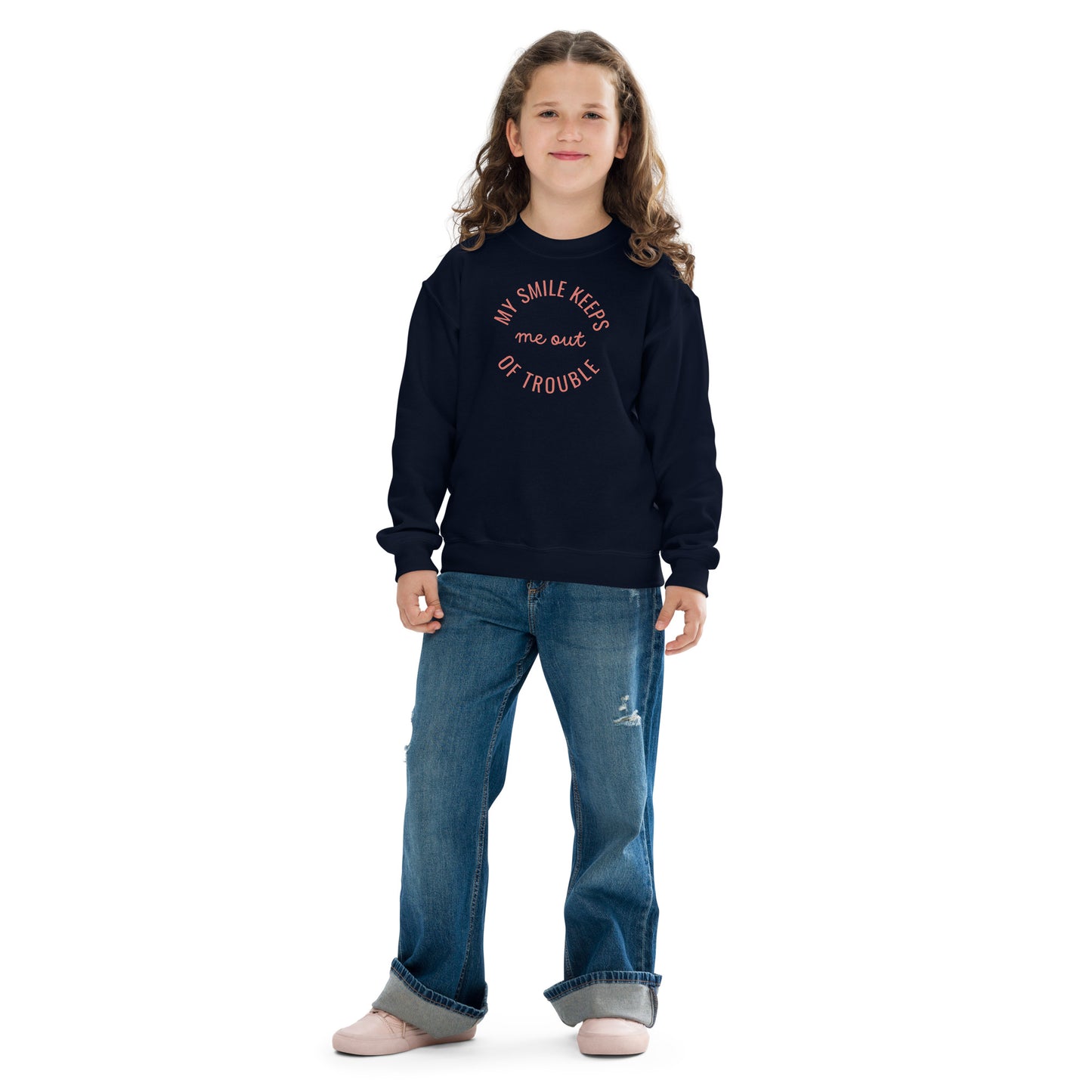 youth crew neck sweatshirt with 'My Smile Keeps Me Out of Trouble' text design