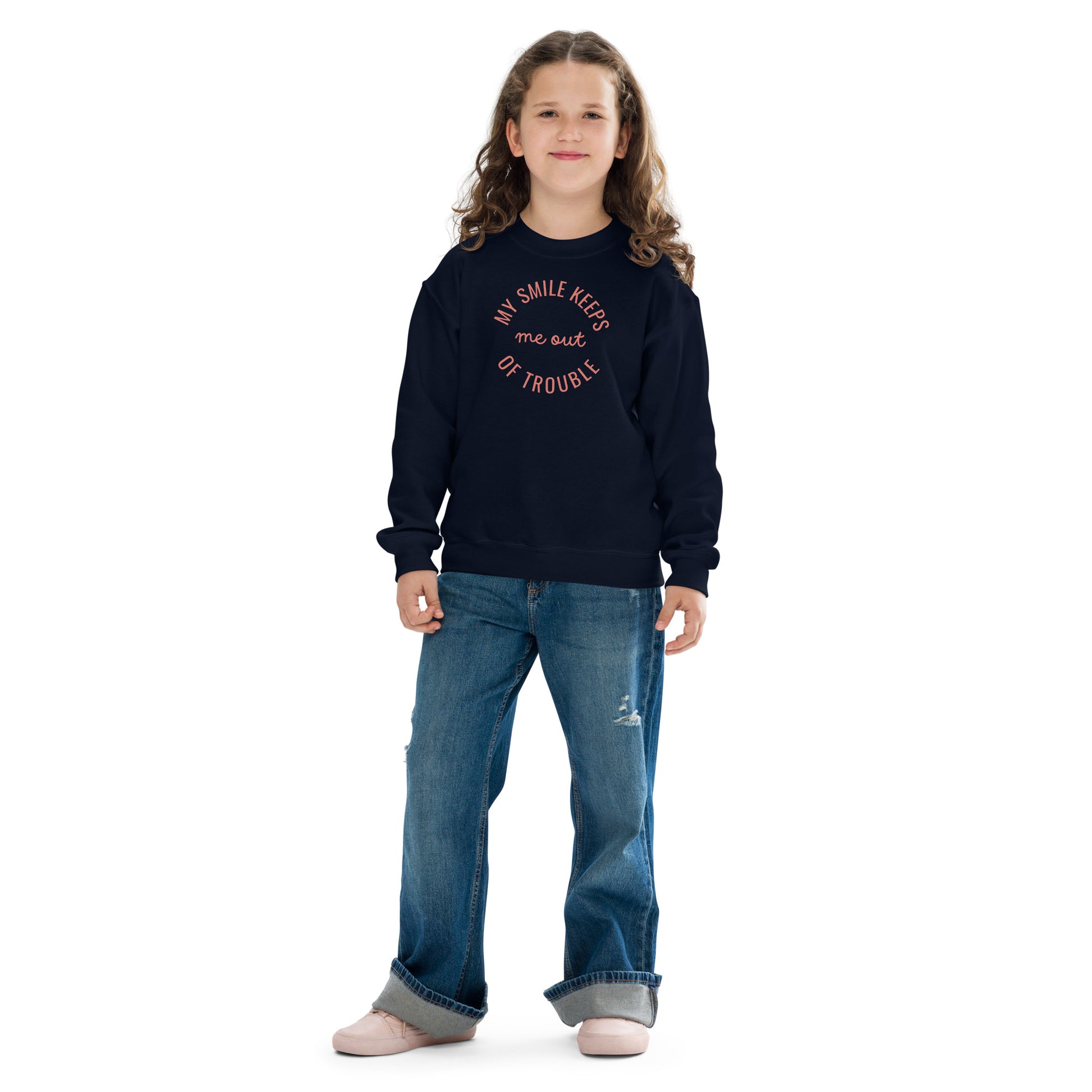 youth crew neck sweatshirt with 'My Smile Keeps Me Out of Trouble' text design