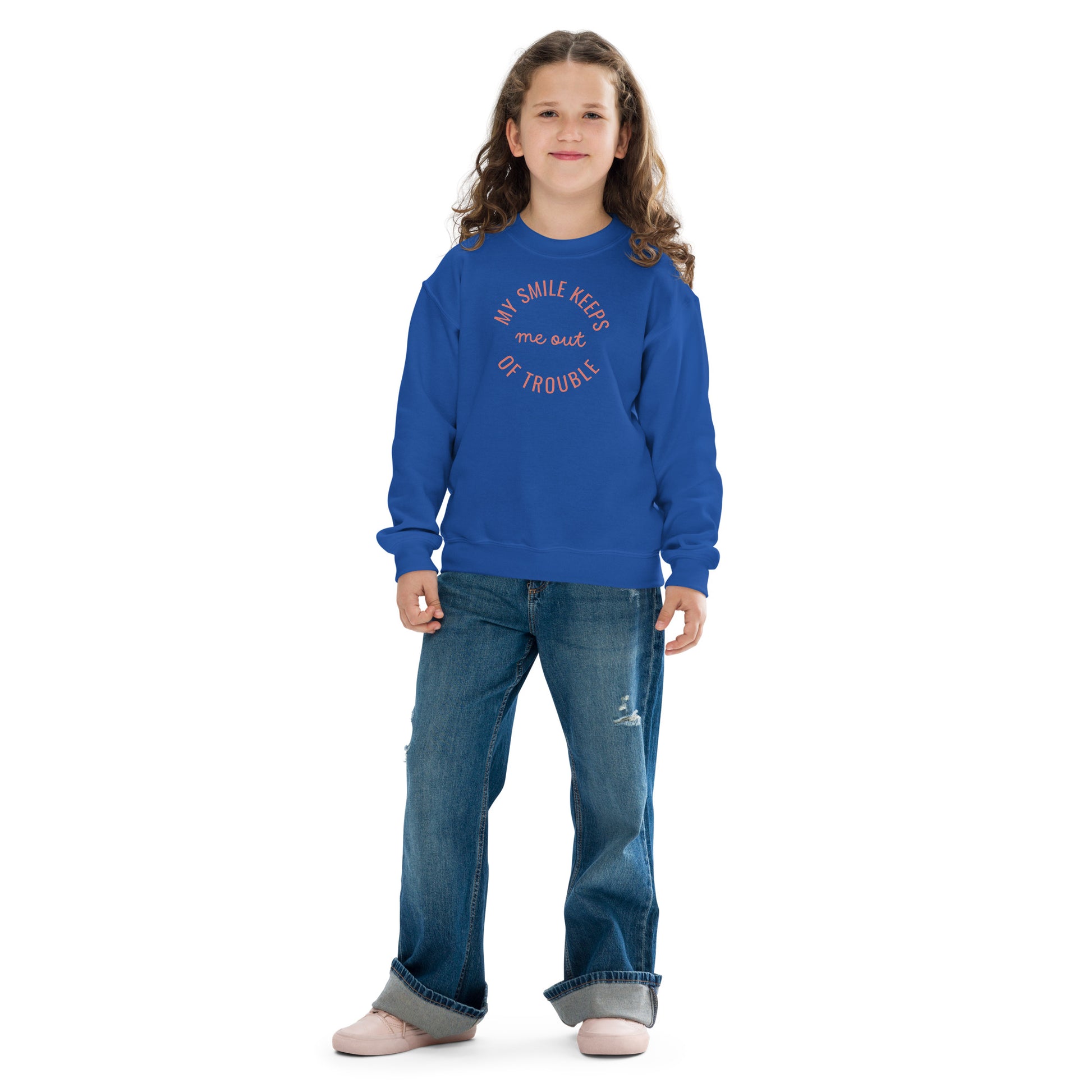 youth crew neck sweatshirt with 'My Smile Keeps Me Out of Trouble' text design