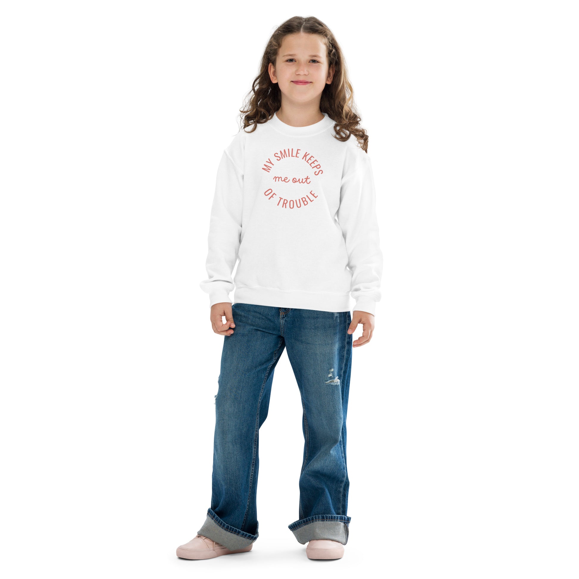 youth crew neck sweatshirt with 'My Smile Keeps Me Out of Trouble' text design