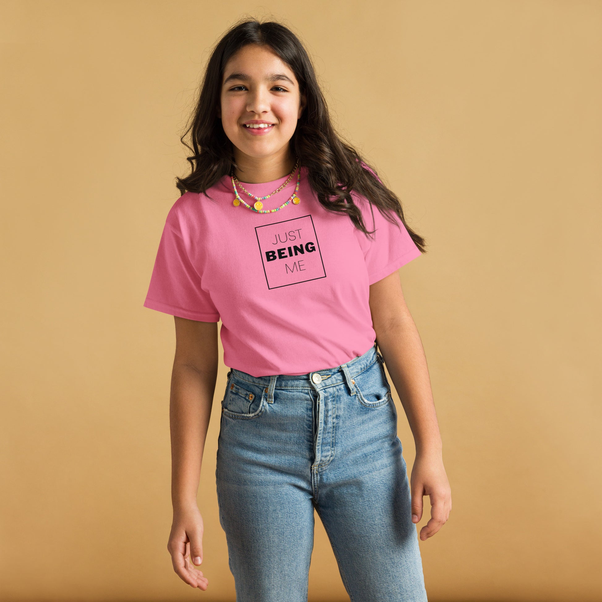 youth t-shirt with 'Just Being Me' text design in bright colors