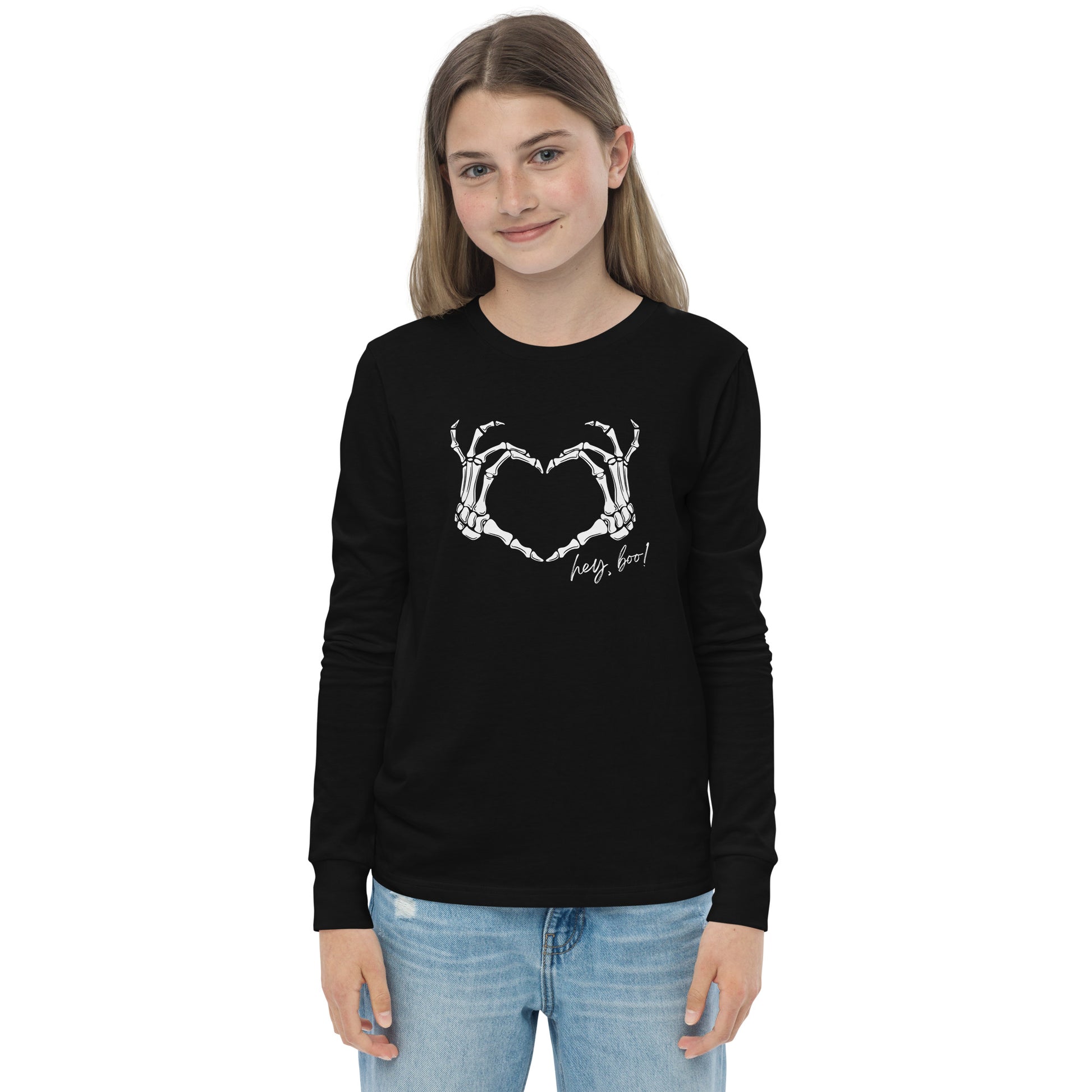 youth long sleeve t-shirt with skeleton hands heart graphic and 'Hey Boo!' text