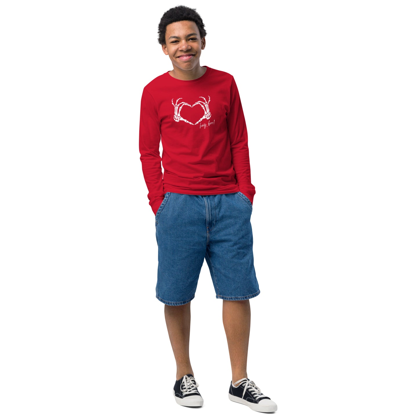 youth long sleeve t-shirt with skeleton hands heart graphic and 'Hey Boo!' text