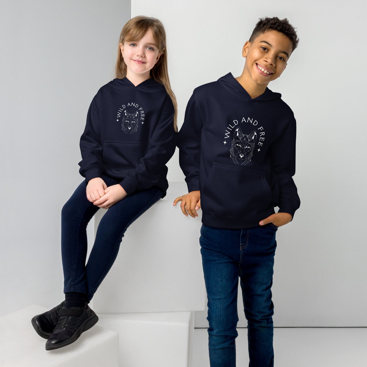 youth hoodie with 'Wild and Free' wolf graphic design
